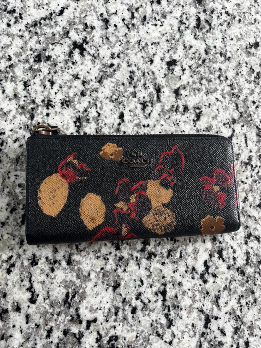 COACH Black Floral Zip-Around Wallet with Gold and Red Accents